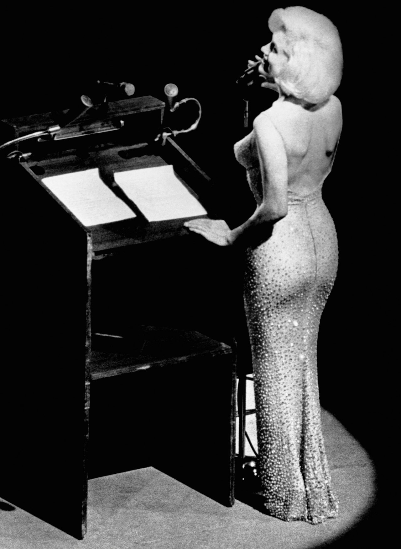 Actress Marilyn Monroe sings "Happy Birthday" to President John F. Kennedy at Madison Square Garden, for his upcoming 45th birthday.