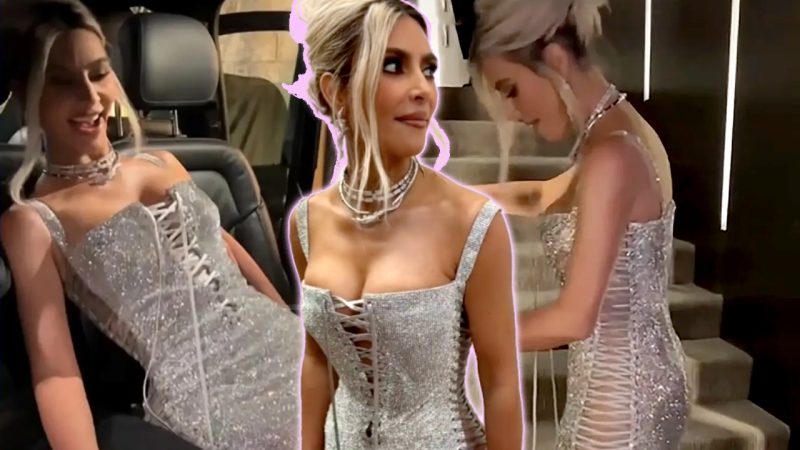 Kim Kardashian can't walk up stairs in her Dolce & Gabanna dress and it's one heck of a watch